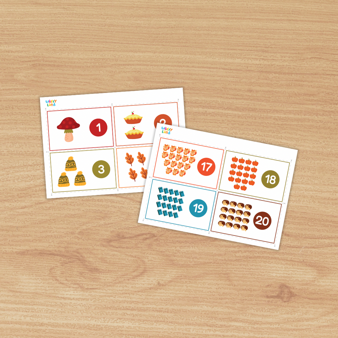 Set of printable counting cards on a wood background featuring autumn icons—mushroom, apple pies, leaves, trees, hedgehogs, foxes, and books. Each card shows a group of items with a large numeral in a colored circle (e.g., 1, 2, 8, 9, 17, 19), designed to practice counting numbers 1–20.