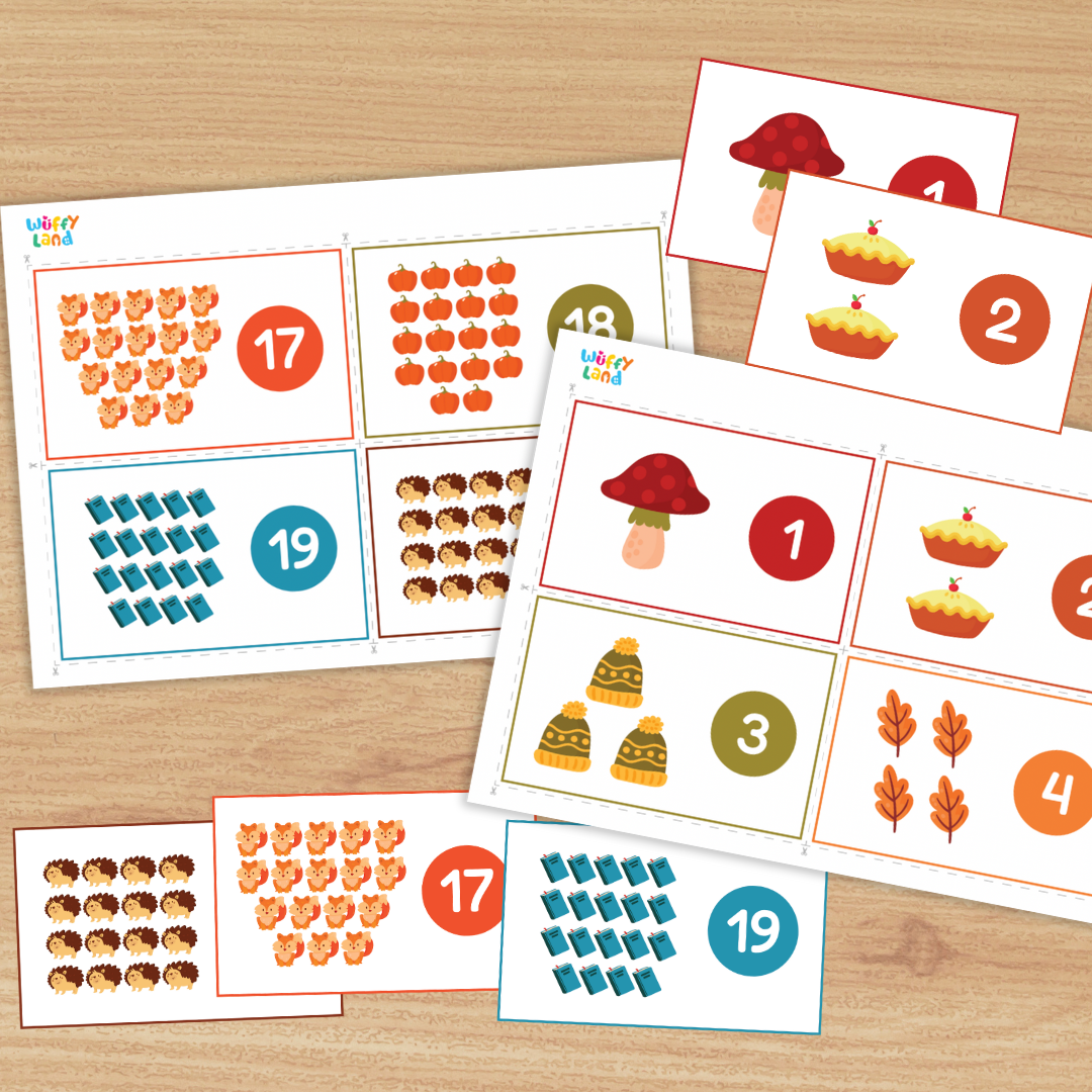 Set of printable counting cards on a wood background featuring autumn icons—mushroom, apple pies, leaves, trees, hedgehogs, foxes, and books. Each card shows a group of items with a large numeral in a colored circle (e.g., 1, 2, 8, 9, 17, 19), designed to practice counting numbers 1–20.