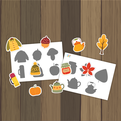 Colorful fall cutout tokens showing thermos flask yellow sweater acorn pumpkin knit hat and ceramic teapot for shadow matching