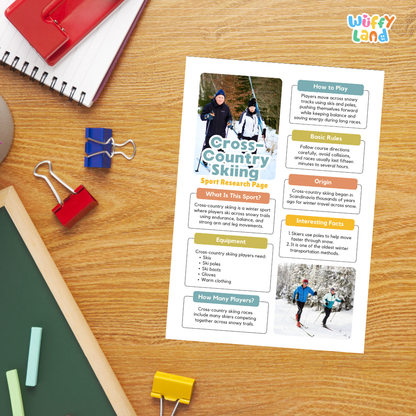 A printed cross-country skiing instruction sheet laid on a wooden desk, surrounded by school or office supplies including a red spiral notebook, blue and red binder clips, a green chalkboard, and a yellow paperclip. The sheet has colorful headings, short activity instructions, and photos of people skiing.