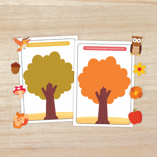 Two printable autumn tree craft templates for kids featuring blank trees with green and orange leaves. The activity invites children to cut and paste seasonal decorations like leaves, acorns, mushrooms, and apples to complete their fall-themed