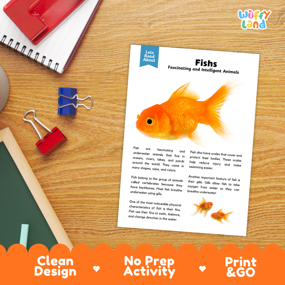 An educational fish activity worksheet titled 'Fishes Fascinating and Intelligent Animals' by Wiffly Land, displayed on a wooden desk with school supplies like binder clips and a notebook. The worksheet features text and an illustration of a goldfish.
