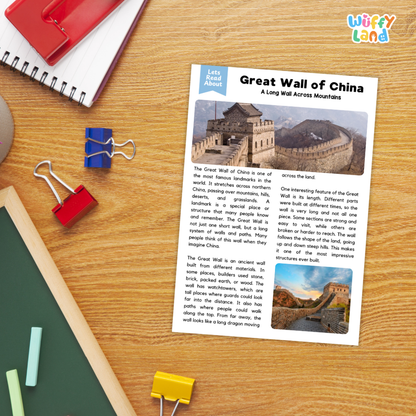 A children's educational poster titled 'Great Wall of China' laid on a wooden desk, surrounded by school supplies including a spiral notebook, red and blue binder clips, a green notebook, and a yellow highlighter. The 'Wiffy Land' brand logo appears in the top right corner.