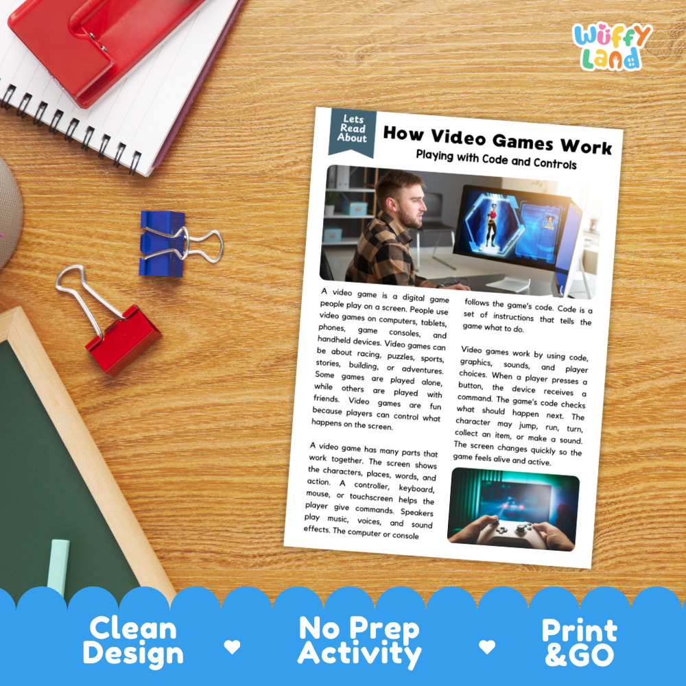 An educational activity sheet titled 'How Video Games Work' displayed on a wooden desk, surrounded by a red notebook, a spiral notebook, and binder clips. The sheet features text, diagrams, and photos related to video game mechanics.