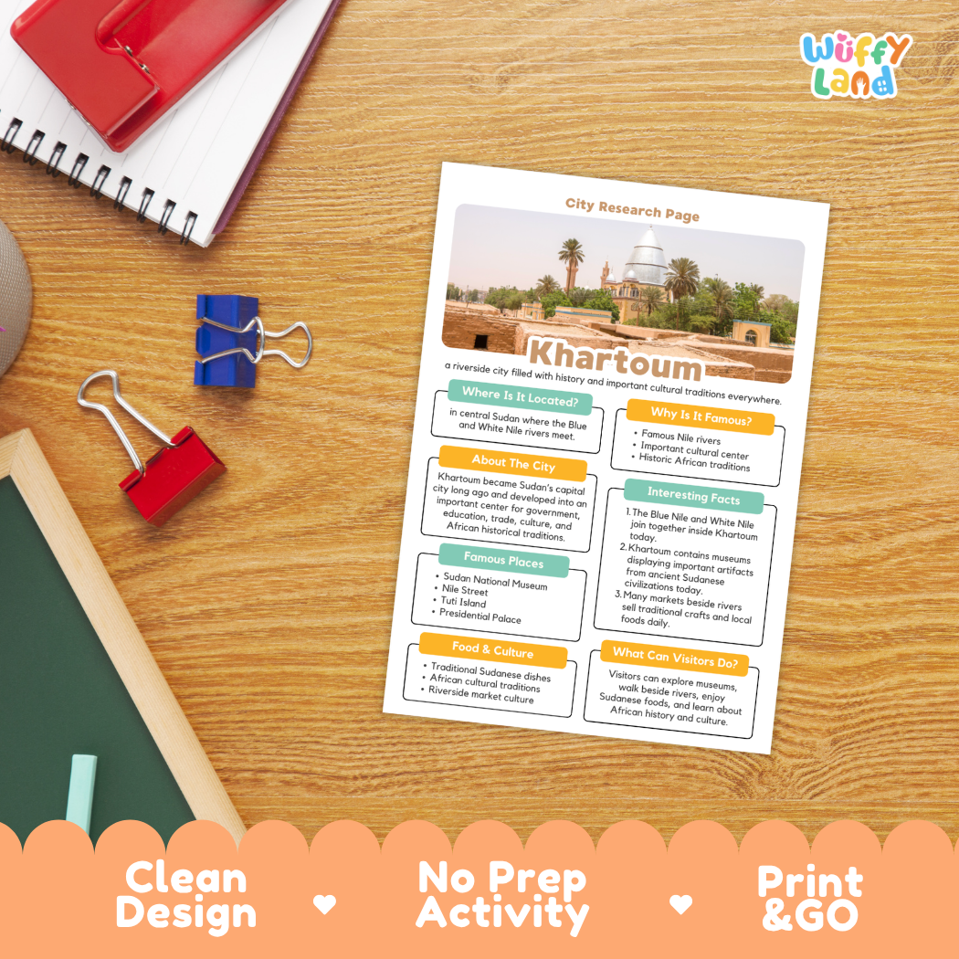 A printed city research page about Khartoum, Egypt, displayed on a wooden desk with notebooks, binder clips, and a chalkboard. The sheet has colorful labeled sections and a small city photo at the top.