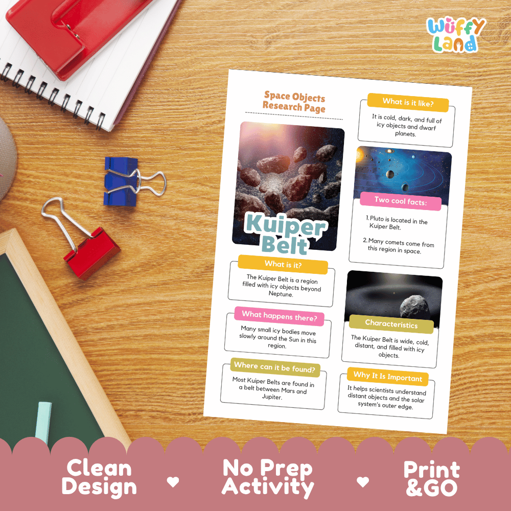 A printed educational activity sheet titled 'Space Objects Research Page' with a Kuiper Belt photo and text boxes, shown on a wooden desk with notebooks, binder clips, and a pen. The sheet has a clean design, no prep is required, and the product is ready to go.