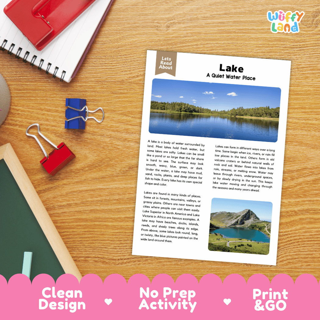 A printed educational worksheet titled 'Lake: A Quiet Water Place' with a lake photo and text, laid on a wooden desk with notebooks, clips, and a pen. A pink banner at the bottom reads 'Clean Design', 'No Prep Activity', and 'Print & GO'.