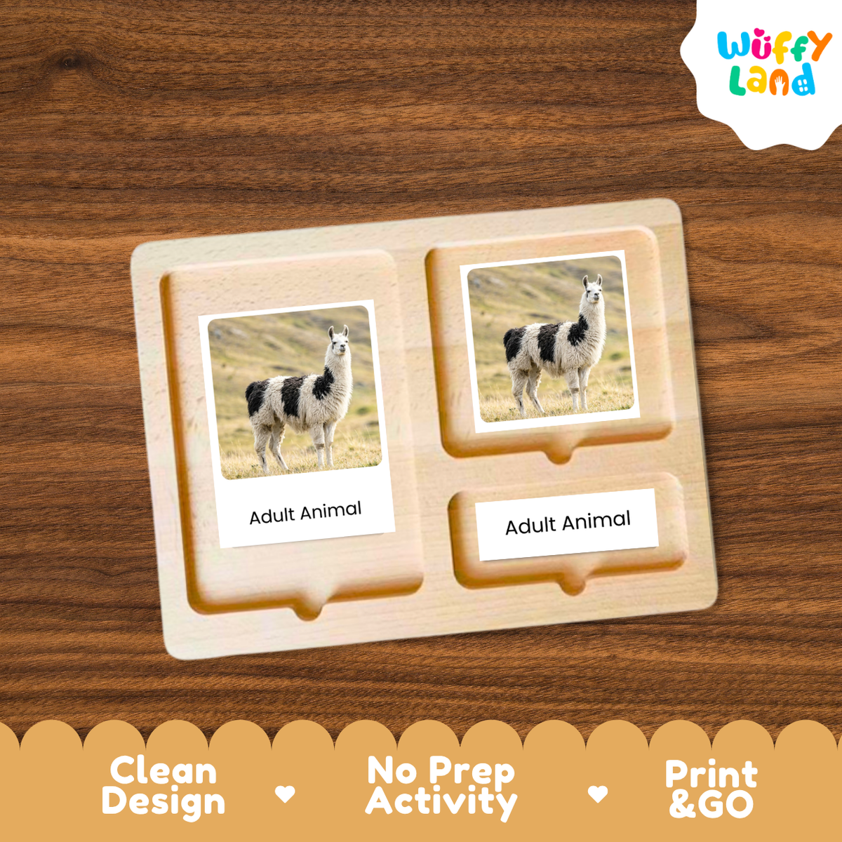 A wooden Montessori-style activity board with two labeled slots reading 'Adult Animal,' each holding a photo card of a llama. The board is shown on a wood-grain background with a 'Wuffy Land' logo in the top right and marketing text along the bottom.