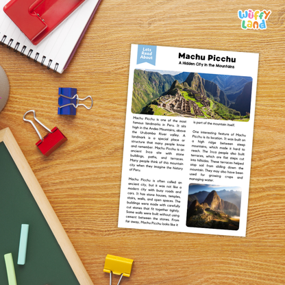 A printed educational poster about Machu Picchu laid on a wooden desk, surrounded by school supplies including a spiral notebook, red and blue binder clips, a green folder, and a yellow paperclip. The poster has a blue 'Let's Learn About' header and a photo of the mountain ruins with the title 'Machu Picchu: A Hidden City in the Mountains.