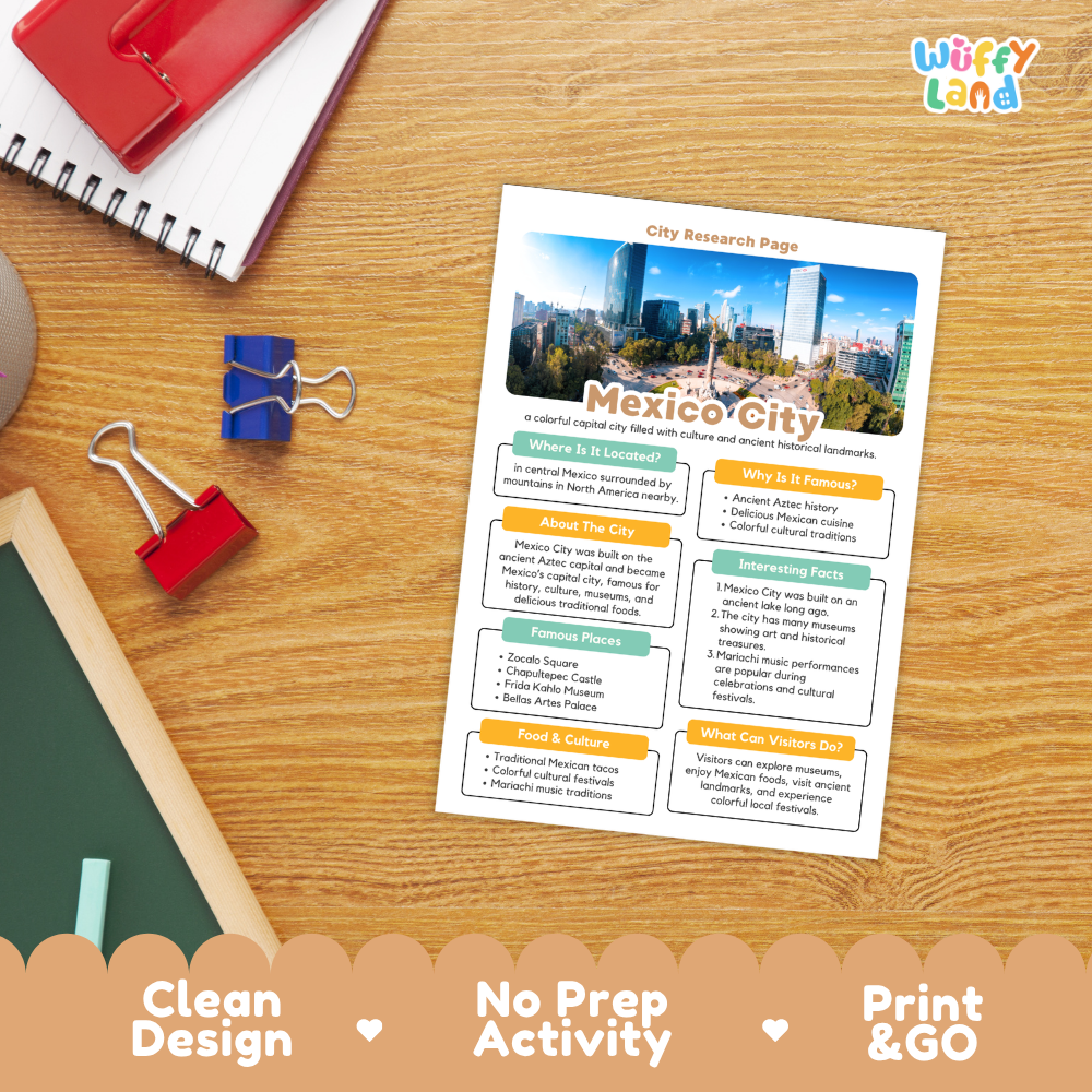A printed city research page about Mexico City is displayed on a wooden desk with school supplies. The page has a colorful city skyline photo at the top and text sections about Mexico City in orange, blue, and green boxes.