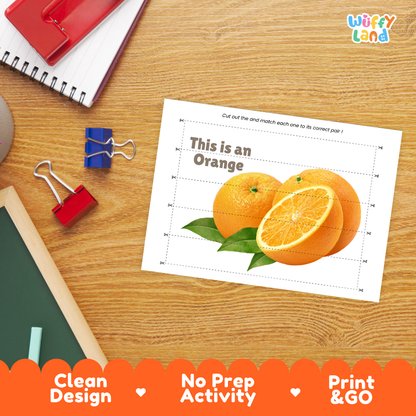 Close-up of puzzle worksheet showing orange images and dotted scissor lines