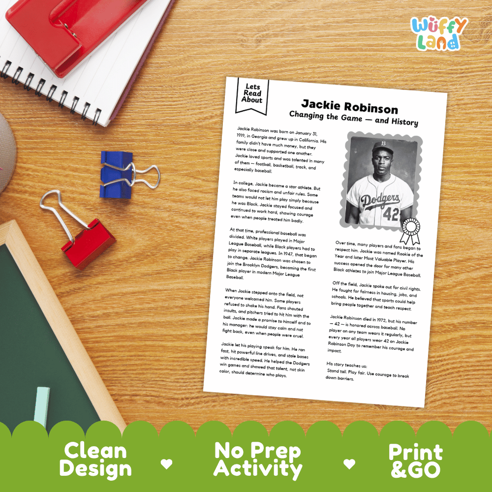 A printed educational worksheet titled 'Jackie Robinson Changing the Game — and History' laid on a wooden desk with school supplies around it. The sheet includes a black-and-white photo of Jackie Robinson as a Los Angeles Dodgers player and blocks of text.