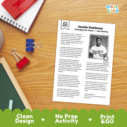A printed educational worksheet titled 'Jackie Robinson Changing the Game — and History' laid on a wooden desk with school supplies around it. The sheet includes a black-and-white photo of Jackie Robinson as a Los Angeles Dodgers player and blocks of text.