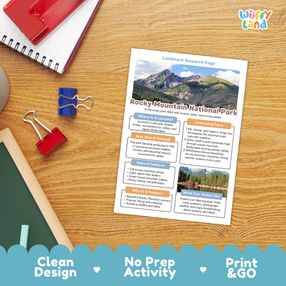 An educational activity sheet titled 'Rocky Mountain National Park Landmark Research Page' displayed on a wooden desk with school supplies. The sheet features a colorful layout with text boxes, a map, and a landscape photo.