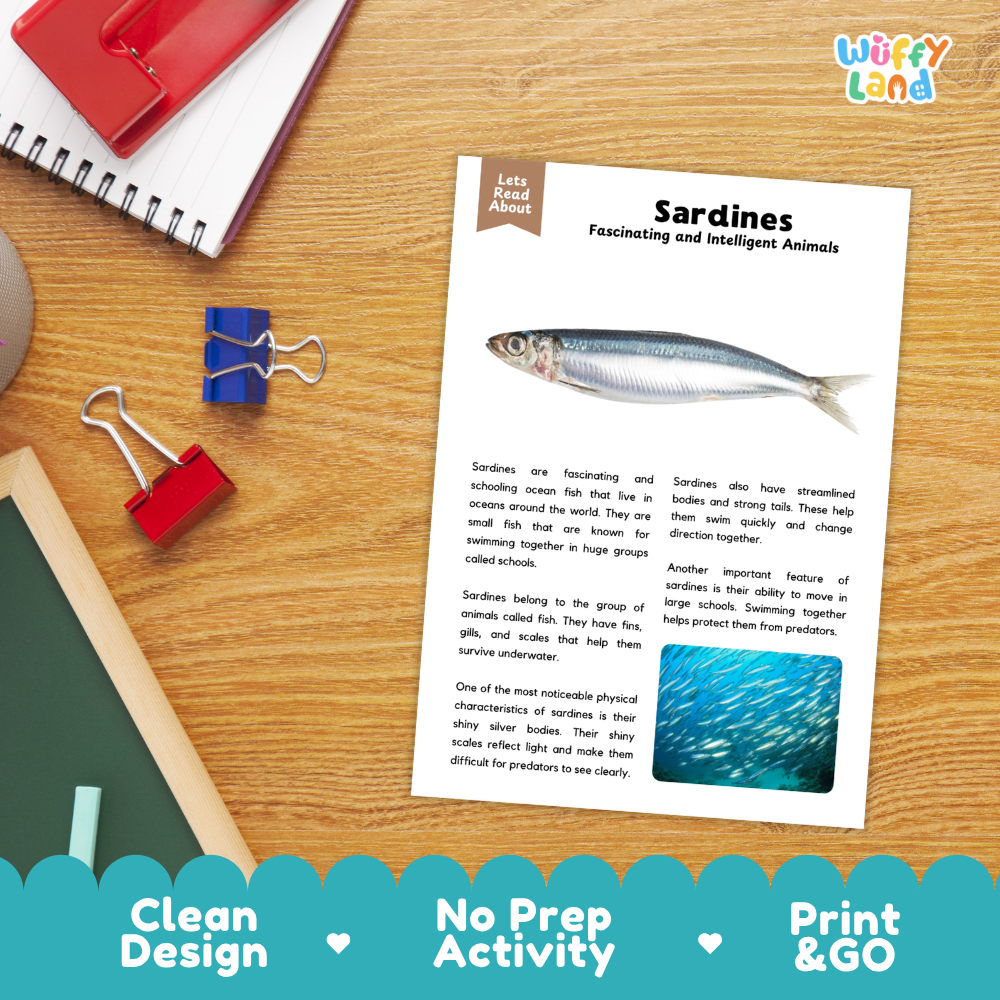 An educational reading activity sheet about Sardines, styled on a wooden desk with school supplies. The sheet features a silver fish illustration and a blue water scene, with 'Lets Read About' and 'Sardines' printed on it.