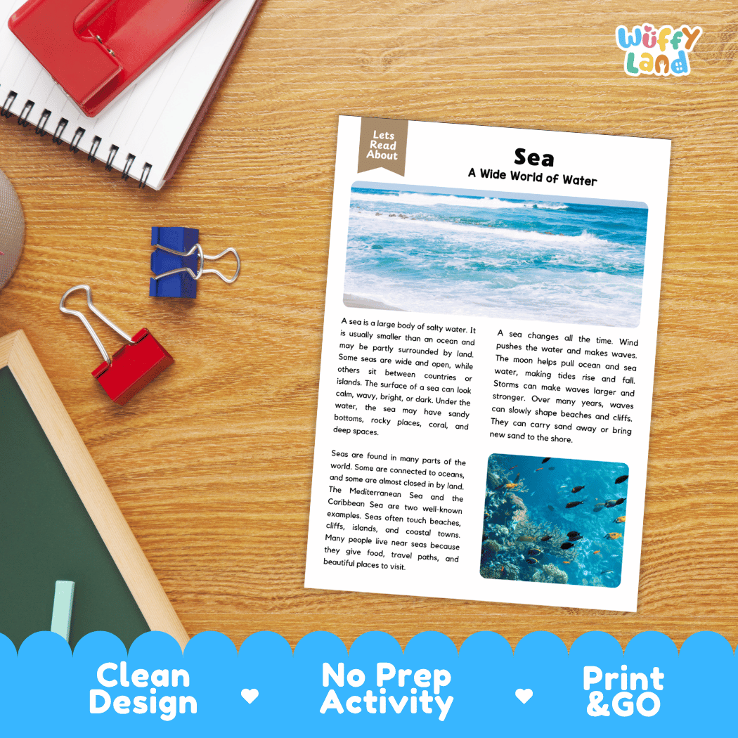 A printed educational worksheet titled 'Sea: A Wide World of Water' laid on a wooden desk with notebooks, clips, and pens around it. The sheet includes text about sea water and a small blue sea illustration.