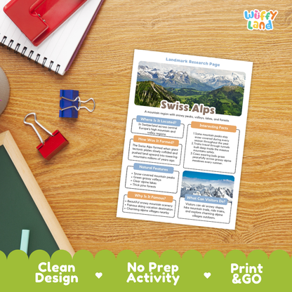 A printed worksheet titled 'Swiss Alps' laid on a wooden desk, surrounded by school supplies including a spiral notebook, binder clips, and a chalkboard. The worksheet has a colorful header, text sections, and mountain photos.