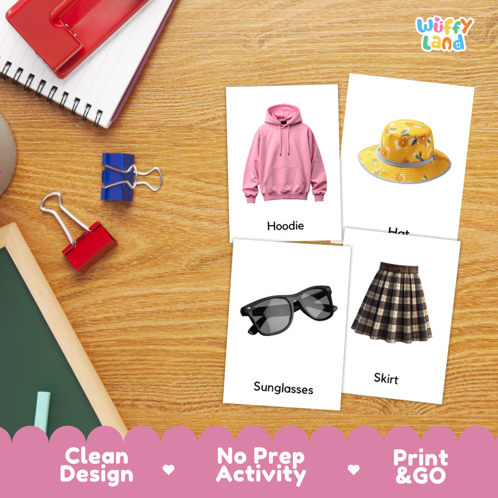 Four educational flashcard activity sheets on a wooden desk background, showing labeled images of a pink hoodie, a yellow hat, black sunglasses, and a plaid skirt. The cards are arranged with school supplies around them, and the brand name 'Wiffy Land' appears in the top right corner.