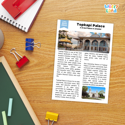 A children's educational reading passage about Topaki Palace in Eritrea, printed on a white card and styled on a wooden desk with colorful paperclips and notebooks.