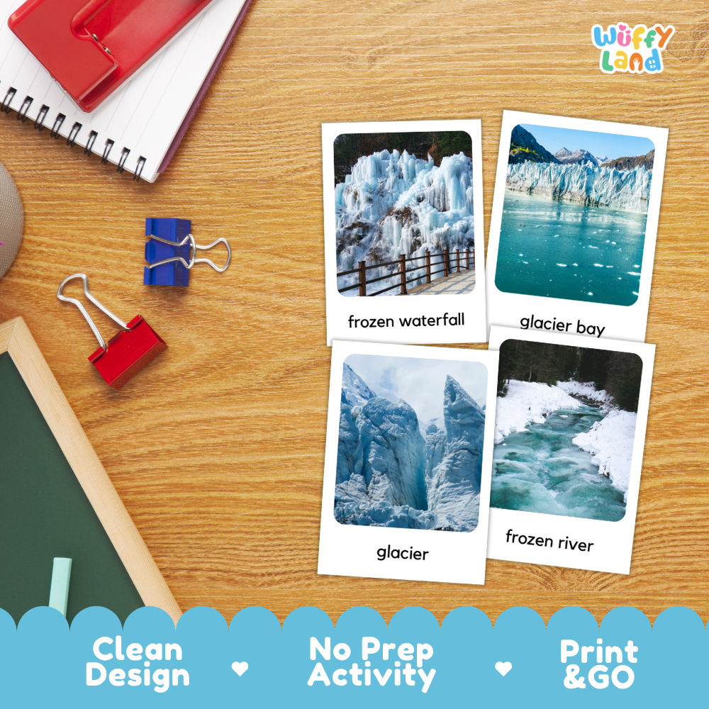 Four printed activity cards showing frozen landscape photos are arranged on a wooden desk with school supplies. The cards read 'frozen waterfall,' 'glacier bay,' 'glacier,' and 'frozen river.