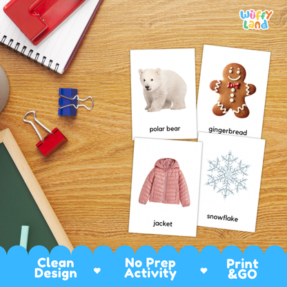 Four printable activity cards showing a polar bear, gingerbread, pink jacket, and snowflake, arranged on a wooden desk with school supplies. The cards are labeled with words beneath the images, and a 'Wiffy Land' logo appears in the top right.